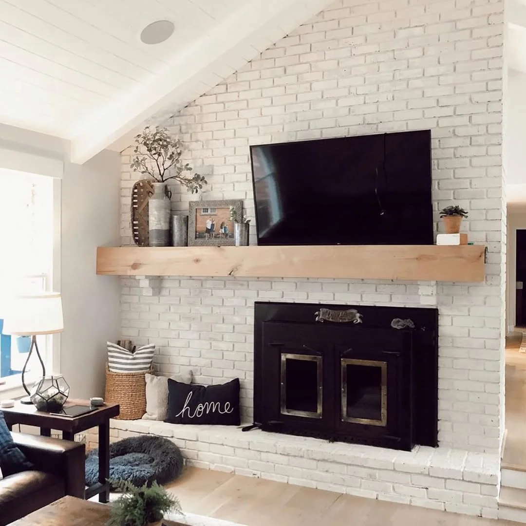 Lime Brick Fireplace with Wood Mantel