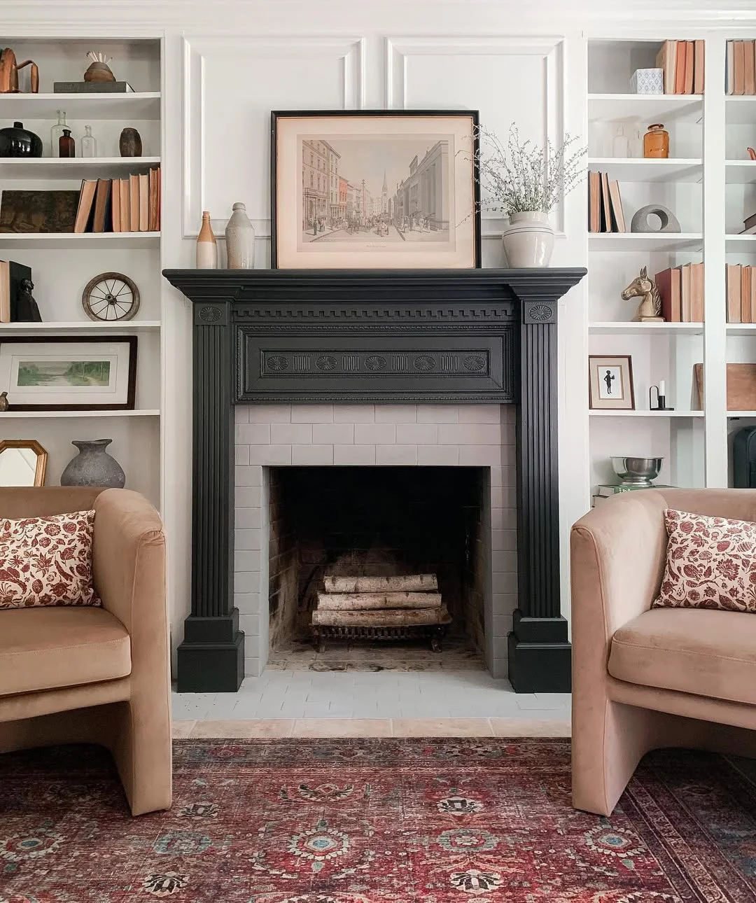 Dramatic Black Fireplace with Built-In Bookshelves