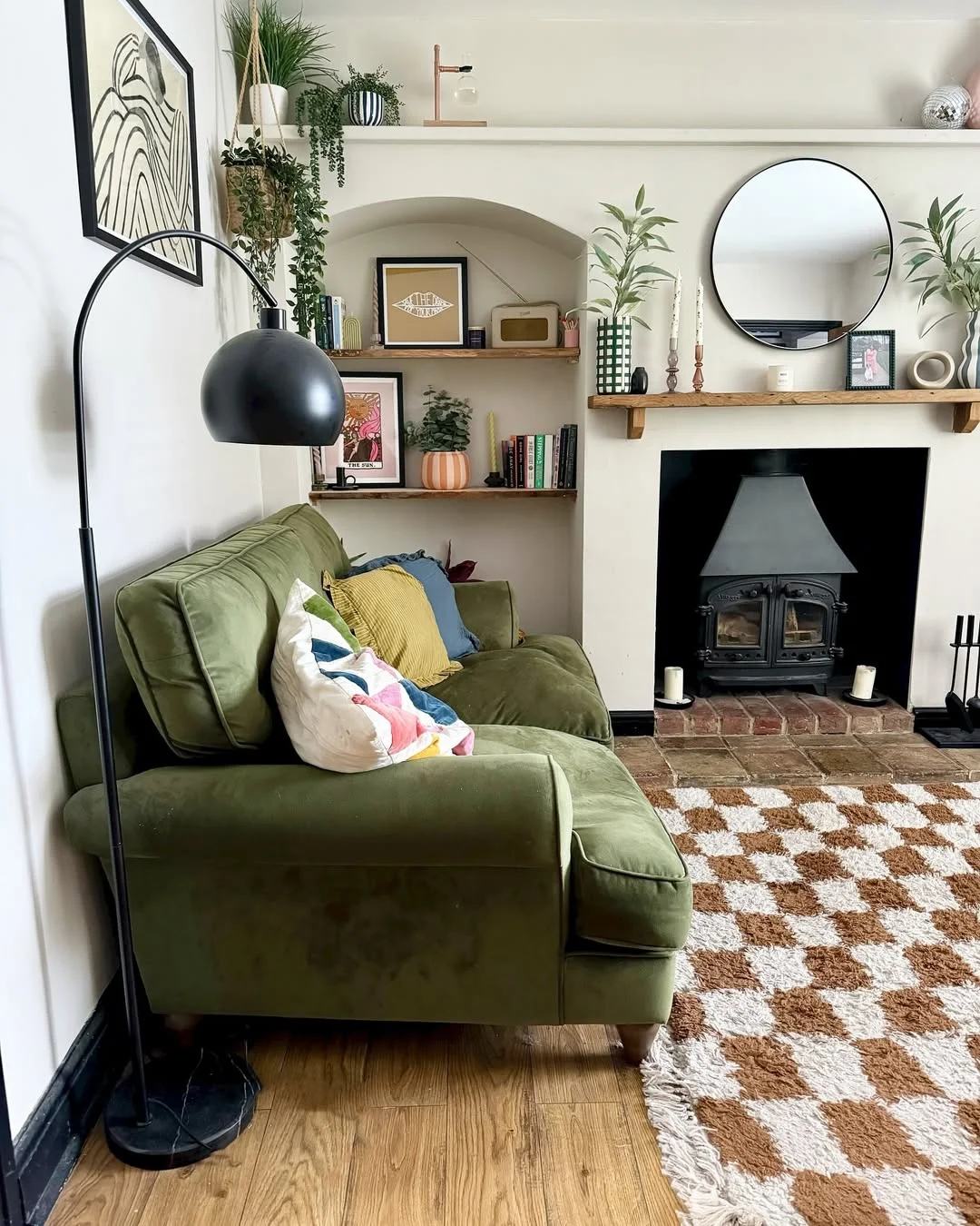 Cozy Living Room with Alcove Shelving and Fireplace