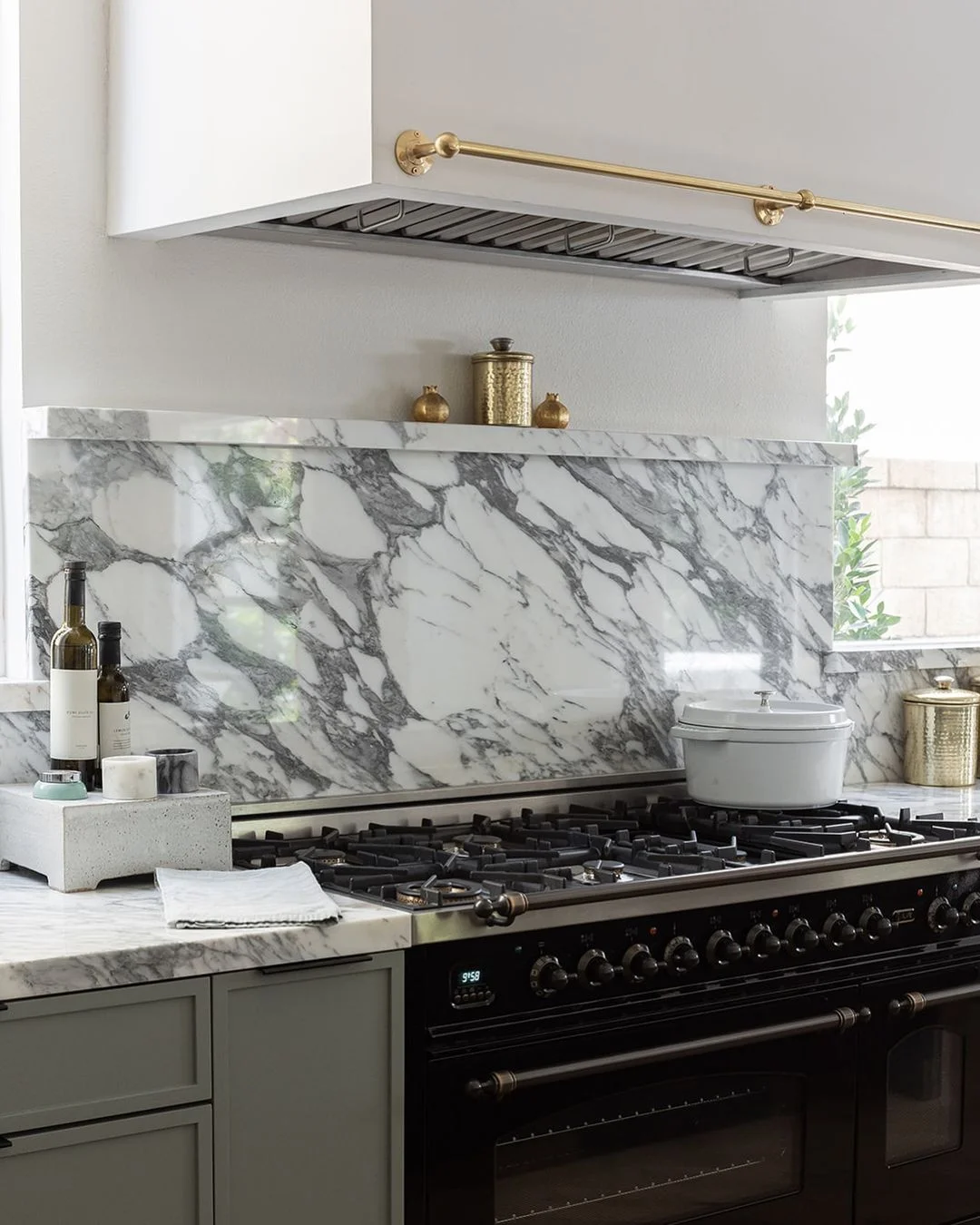 High-Contrast Marble with Brass Elegance