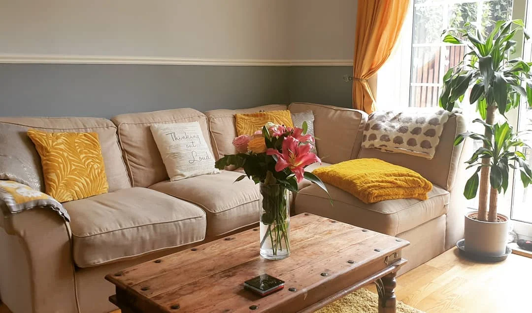 Warm and Inviting Living Room with Pops of Yellow