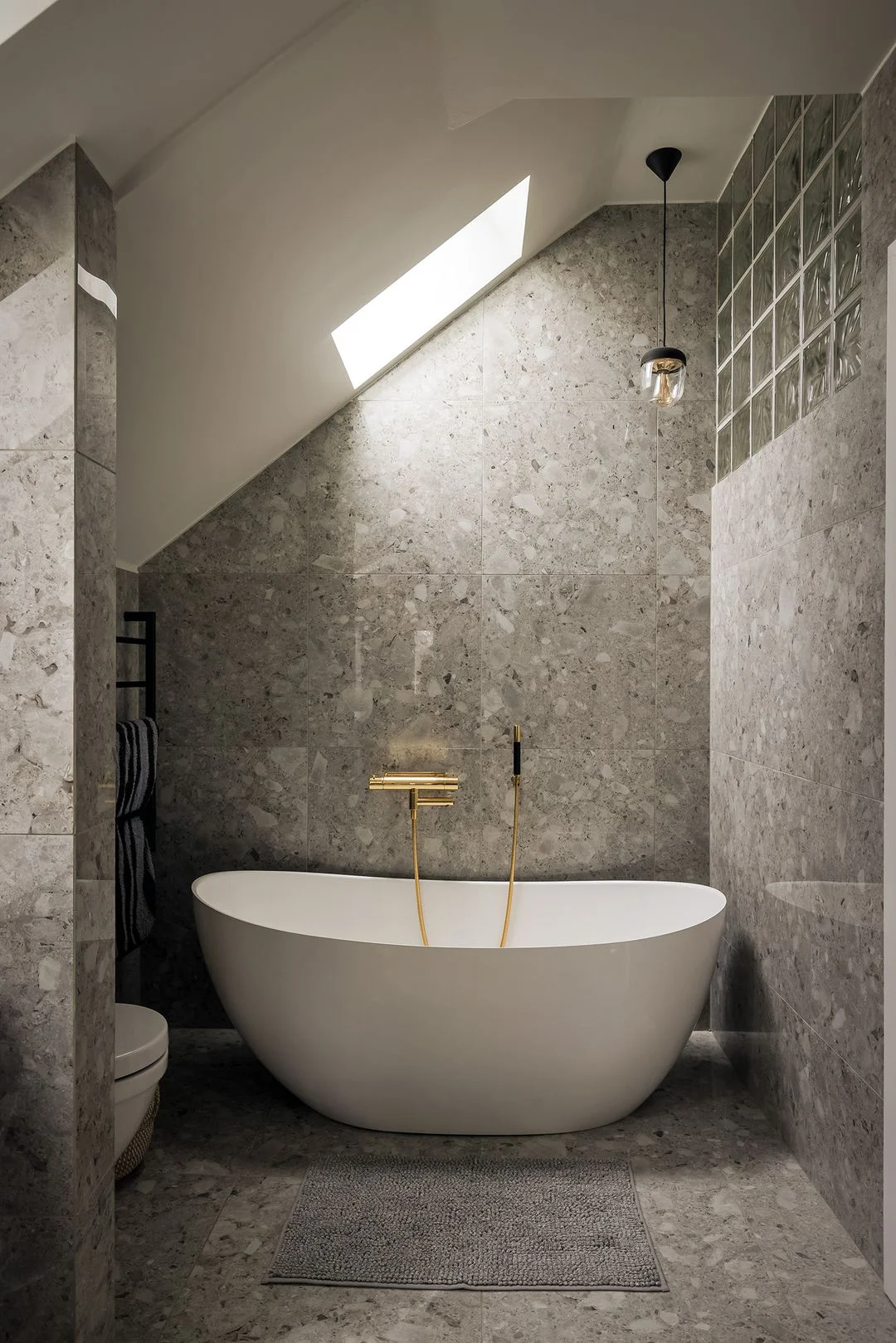 Modern Scandinavian Bathroom with Gold Accents