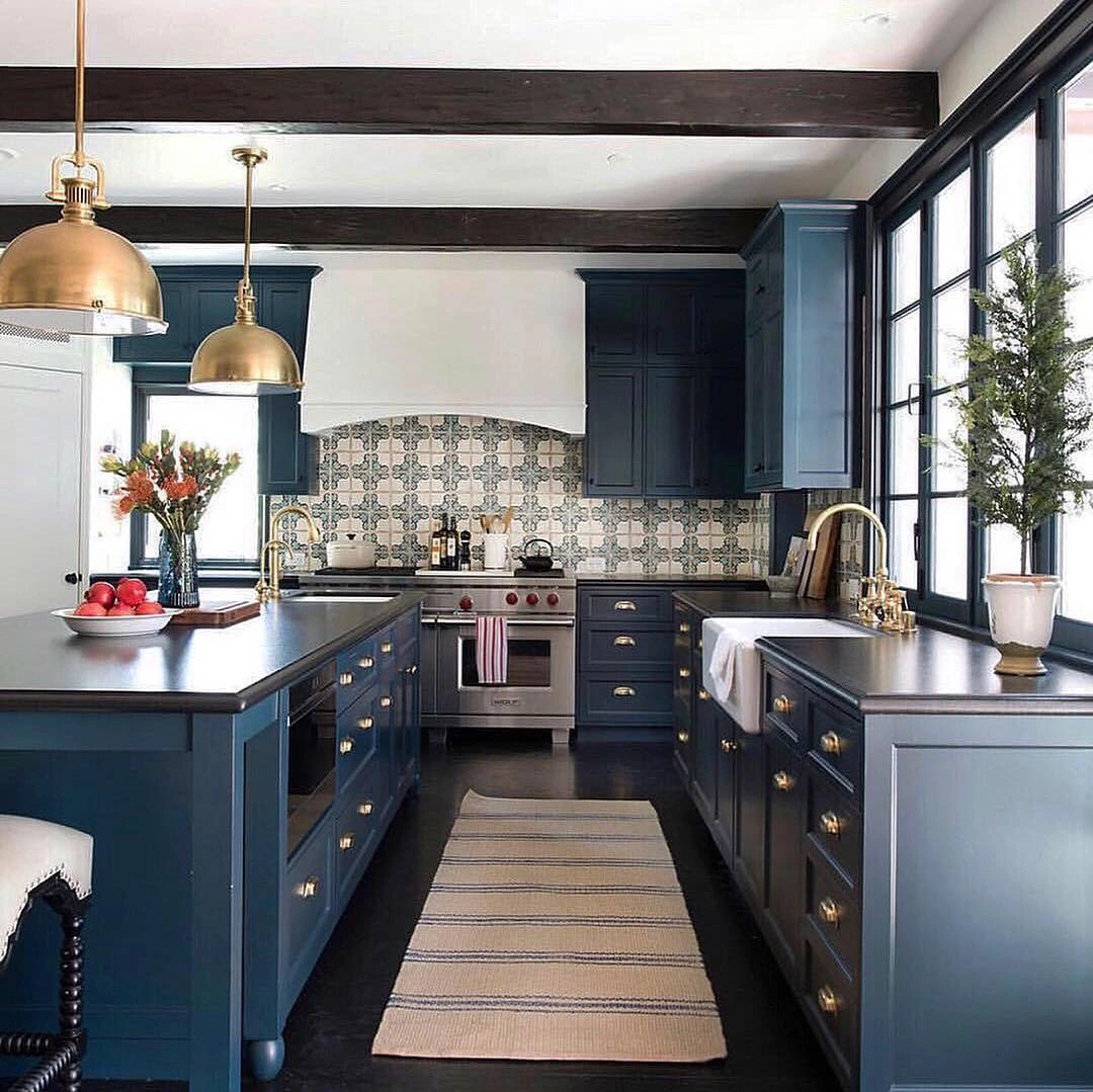 Dramatic Spanish Kitchen with Deep Blue and Tile Details