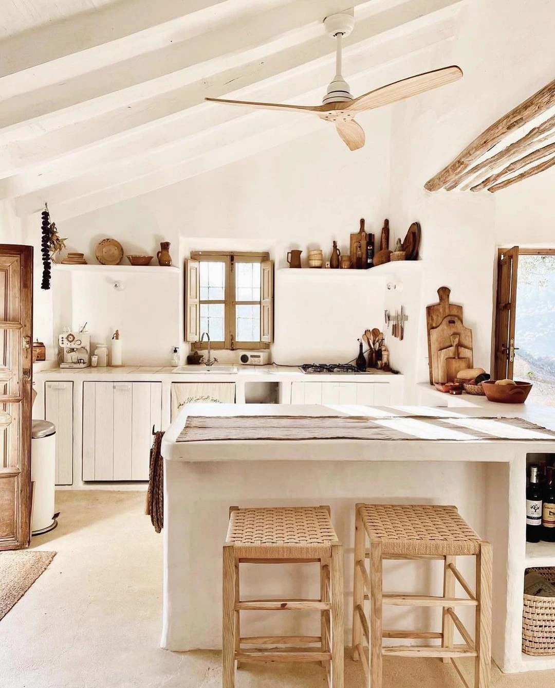 Light and Airy Spanish Kitchen with Rustic Warmth