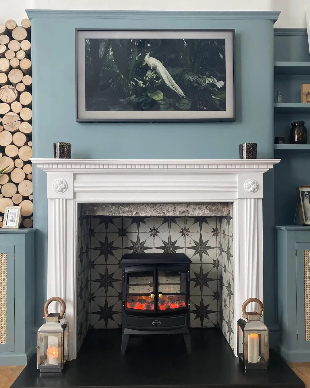 Elegant White Fireplace with Star-Patterned Tile