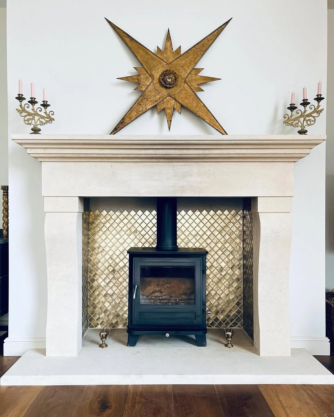 Grand Fireplace with Gold Accents