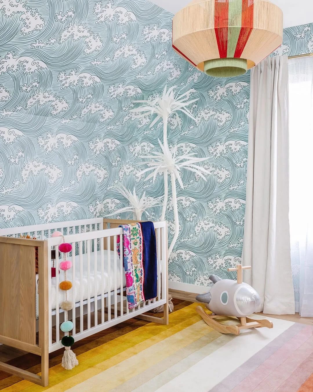 Serene Nursery with Wave Mural