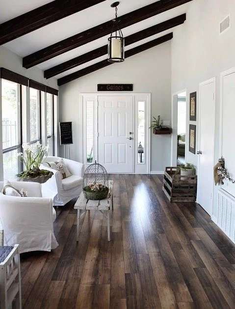 Half Vaulted Entryway with Dark Wood Beams