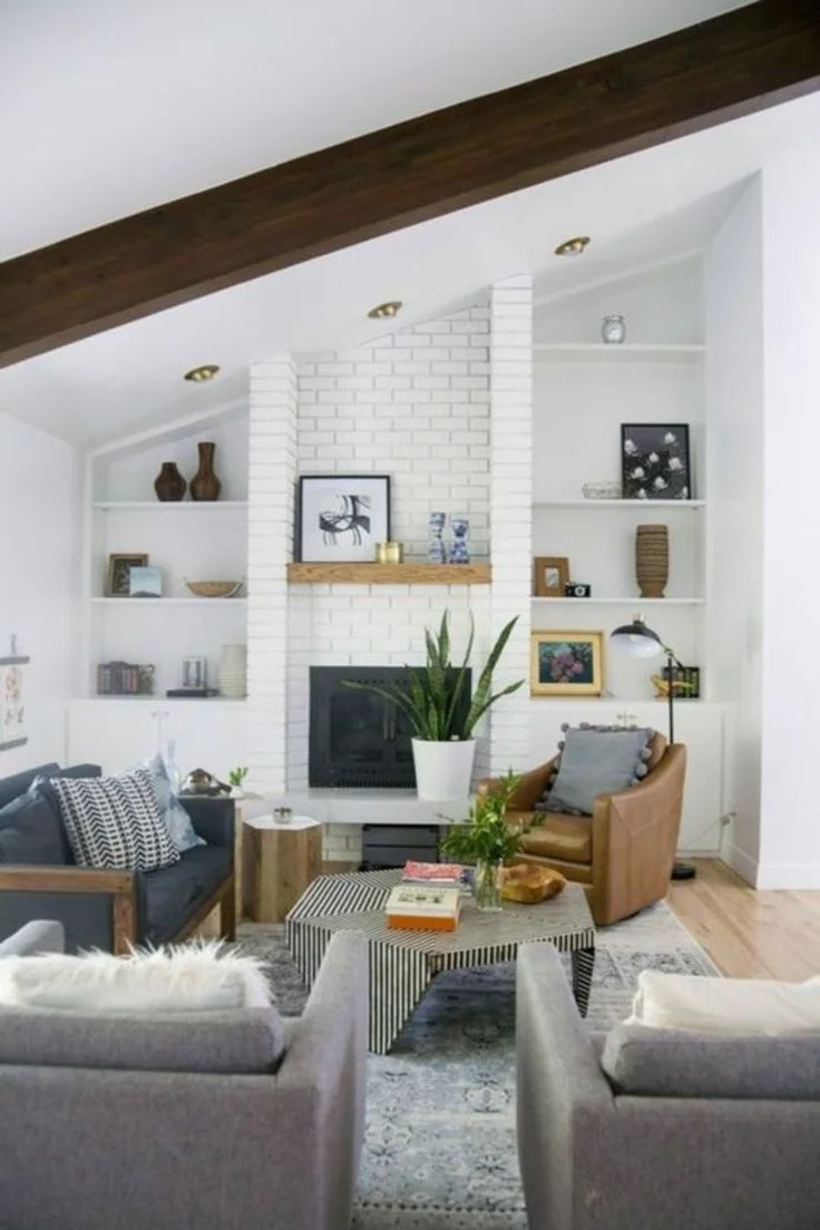 Half Vaulted Living Room with White Brick Fireplace