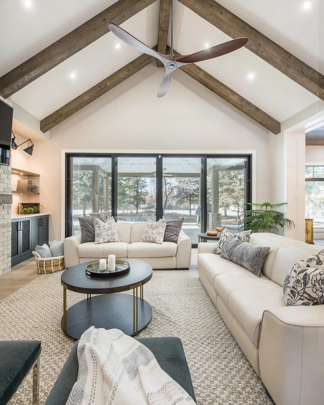 Vaulted Ceiling Living Room with Patio View