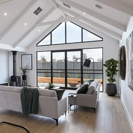 Vaulted Ceiling Living Room with Patio Access