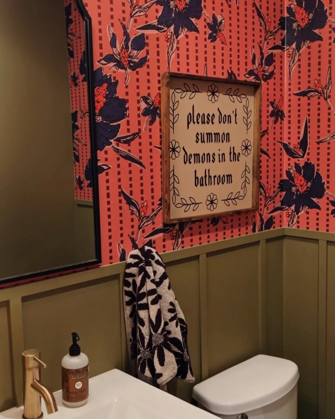 Eclectic Bathroom with Bold Floral Wallpaper and &quot;No Demon Summoning&quot; Sign