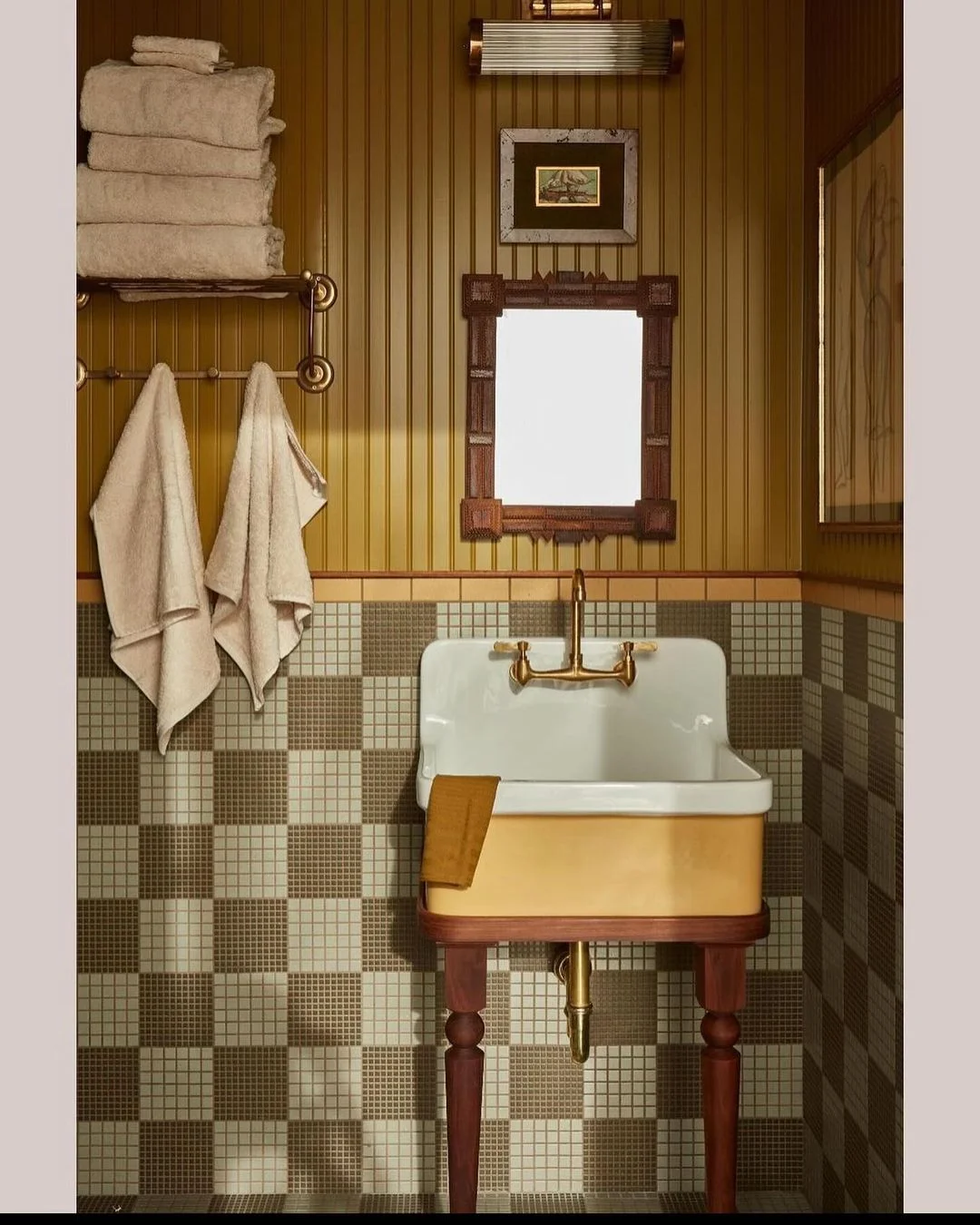 Vintage-Inspired Bathroom with Gold and Brown Checkered Tile