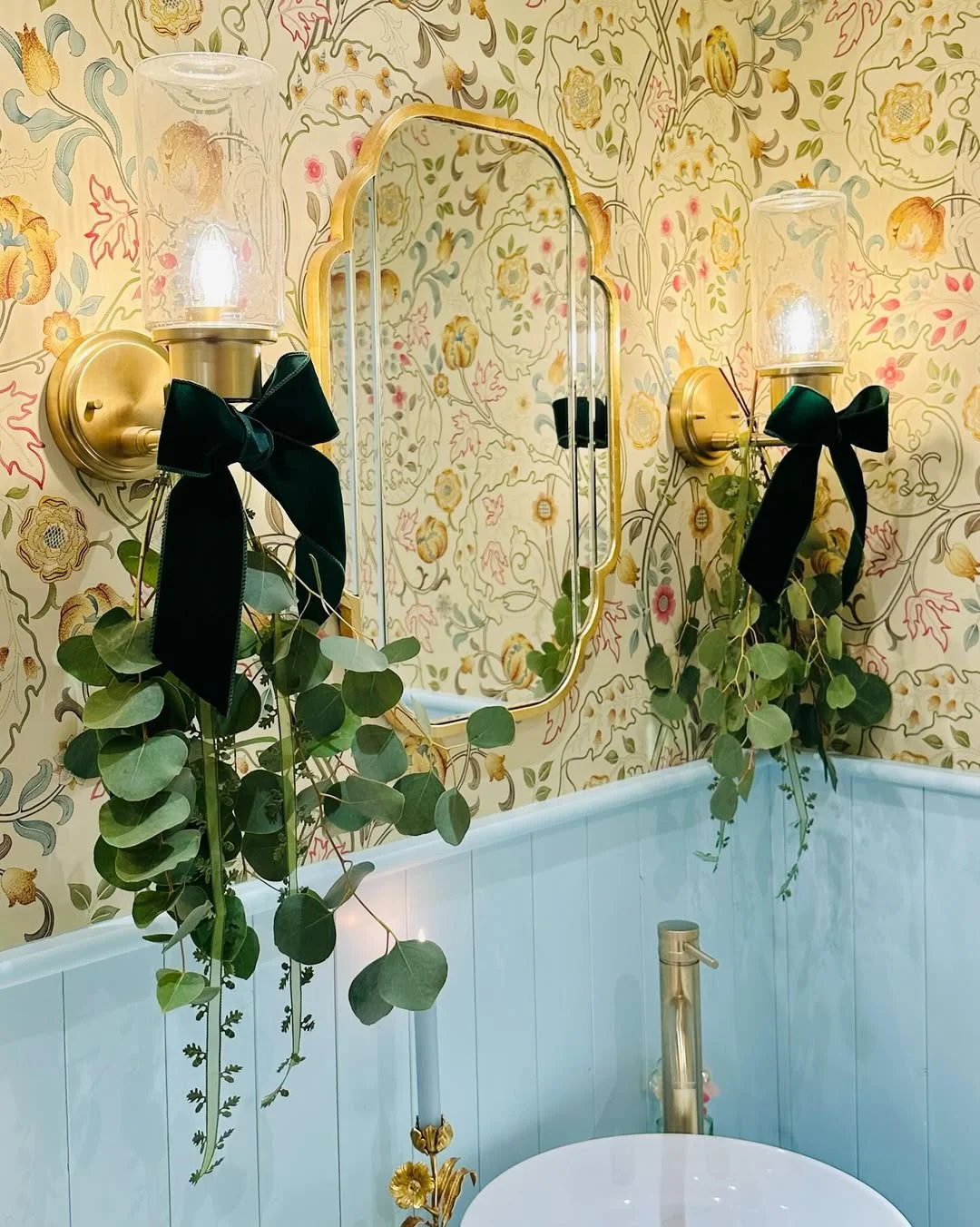 Light Blue Wainscoting Bathroom with Vintage-Inspired Wallpaper