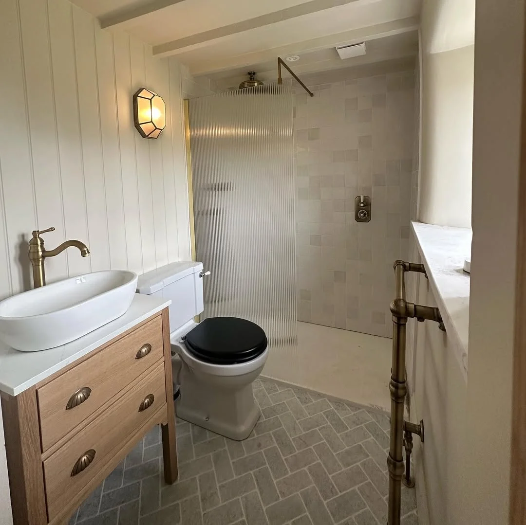 Charming Cottage Bathroom with Reeded Glass Shower