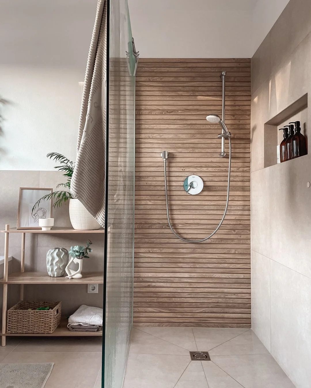 Warm Minimalist Walk-in Shower with Wood Slat Feature Wall