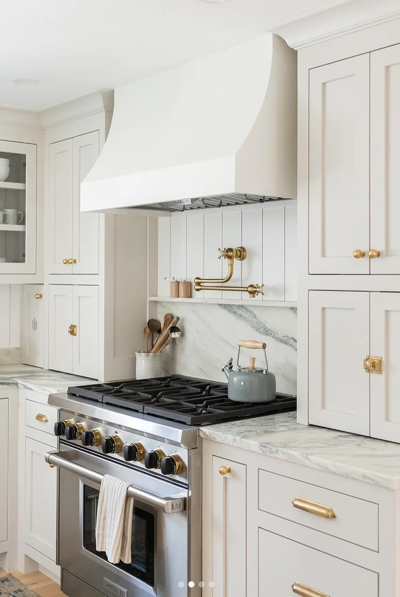 Clean and Glam: White and Gold Cabinets