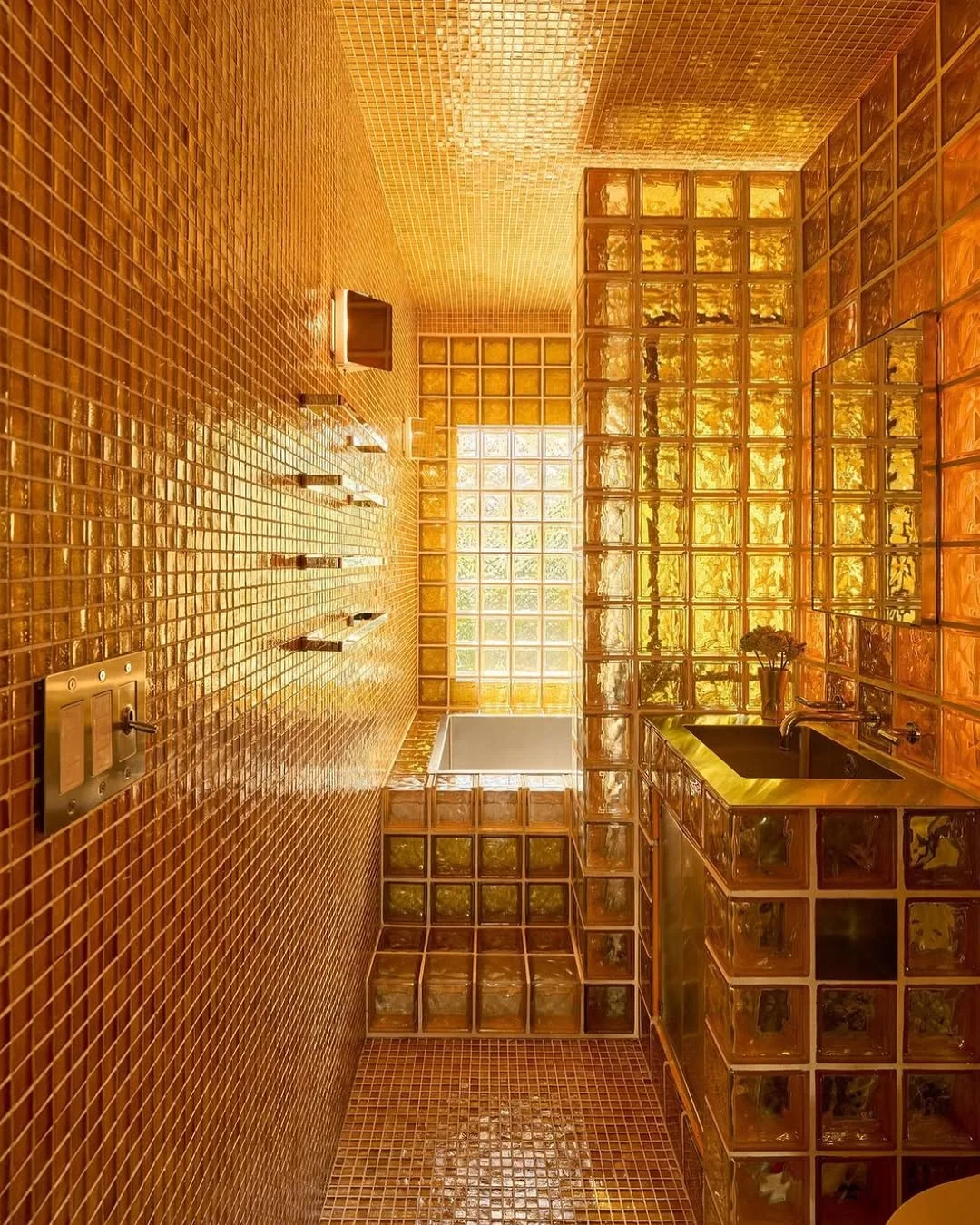 Gold Rush: A Dazzling Yellow Glass Brick Bathroom