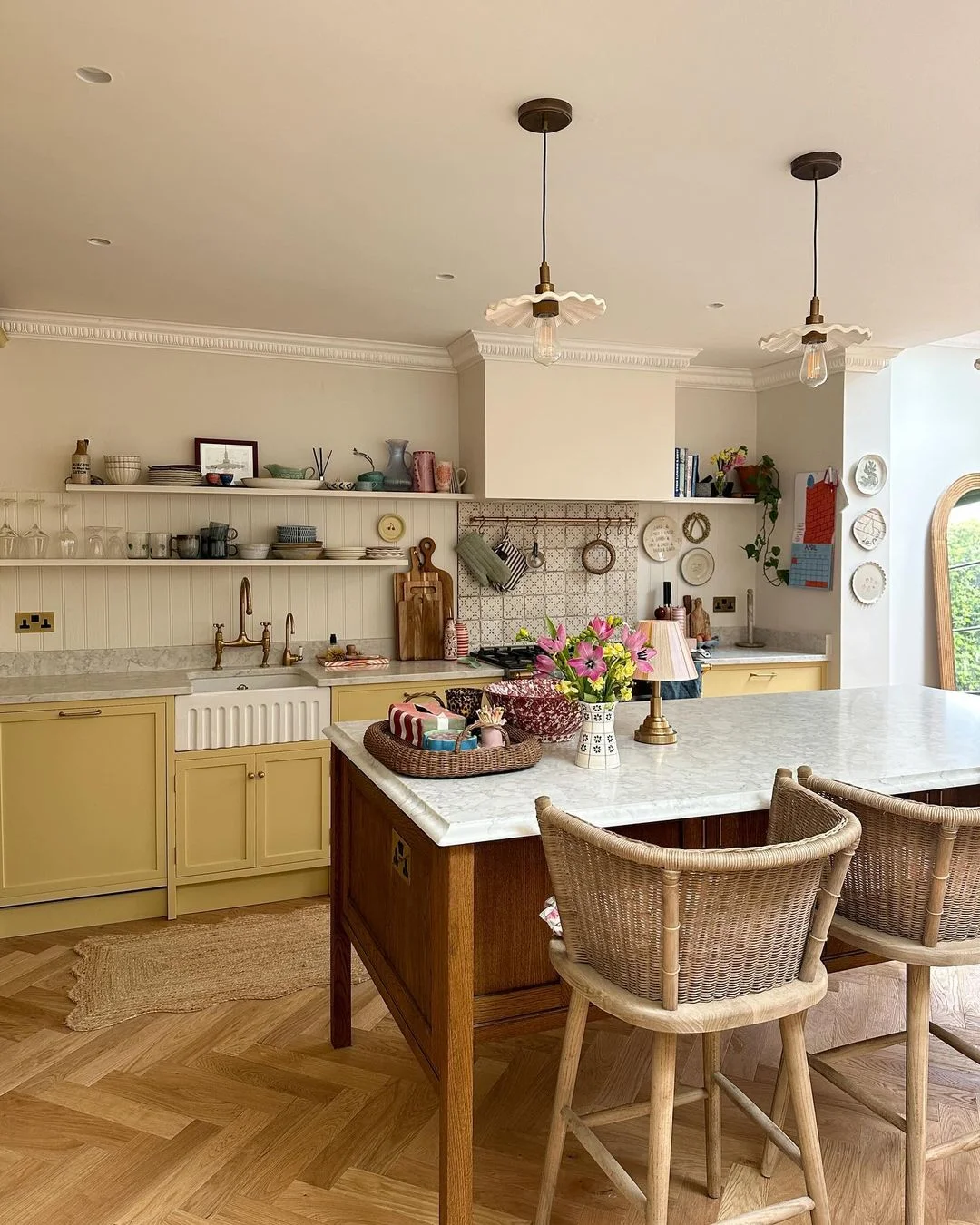 Elegant Yellow Kitchen with Marble Touches